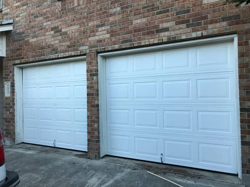 White double garage doors by RL Garage Door Repair